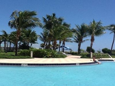 E Beautiful beachfront property with pool partia