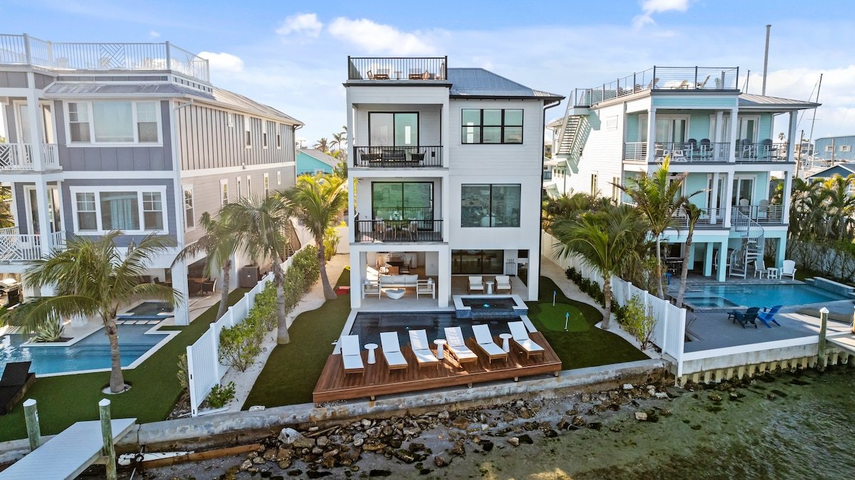Waterfront Luxury Pool Home, Golf Cart, and Bikes! gallery image 3