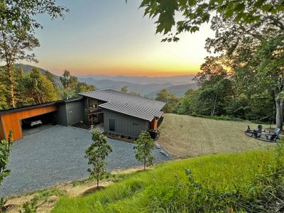 sunset view, hot tub, wood firepit, lawn for games