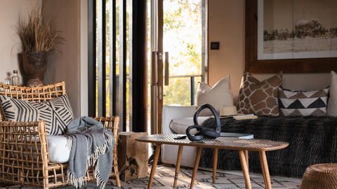 Wilderness Qorokwe - A rich mix of natural materials and colours include bleached timbers, darker stains and accents of rust and burnt orange.