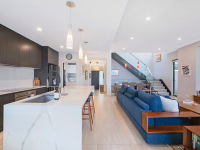 The Stuart: Tri-Level Luxury with Poolside Dining