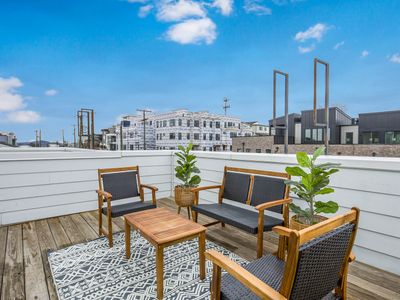 2 Homes – 8 Bedrooms – Sleeps 24! Rooftop Views!