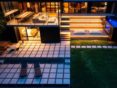 Coastal Forest Retreat with Studio, Pool & Sauna.