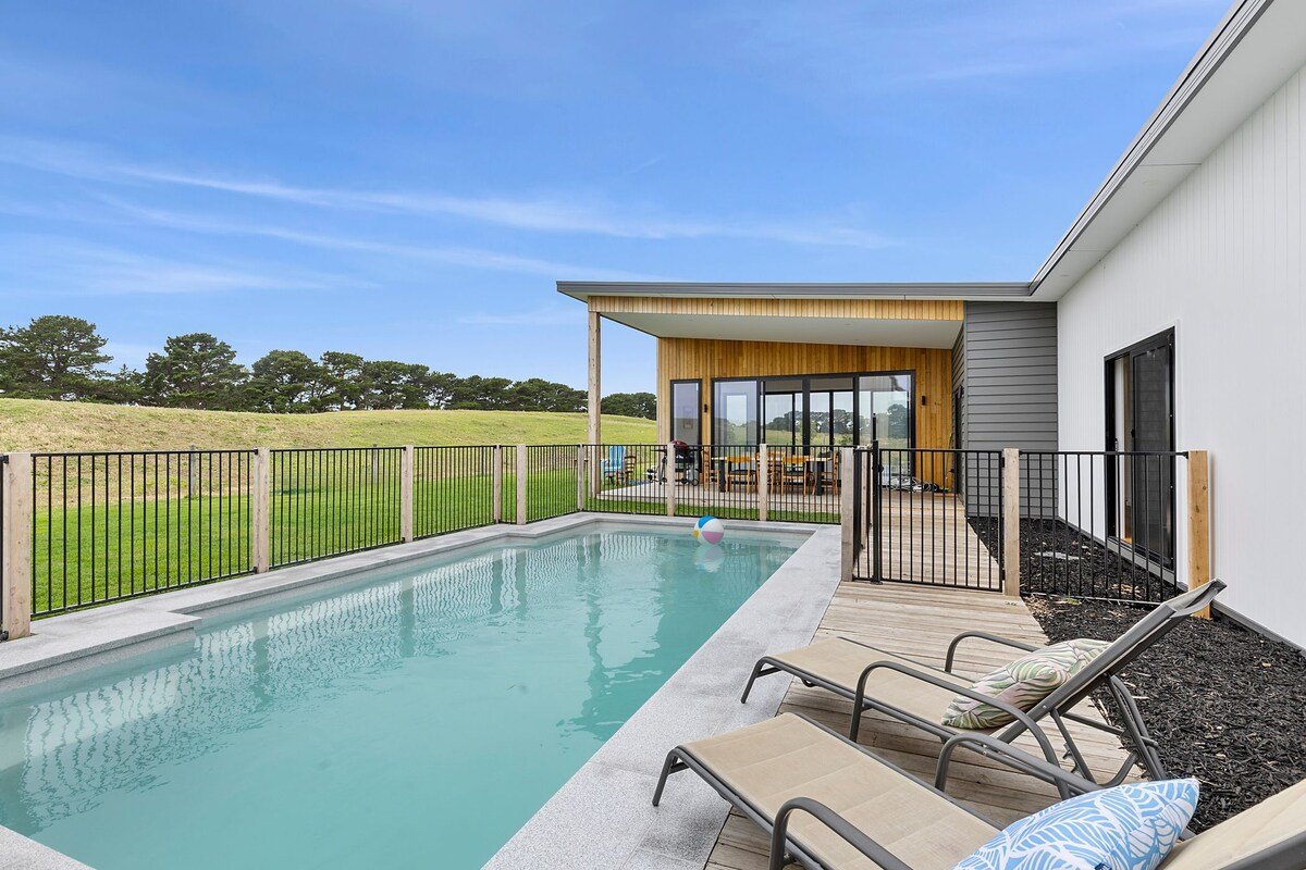 Designer Coastal Home with pool gallery image 3