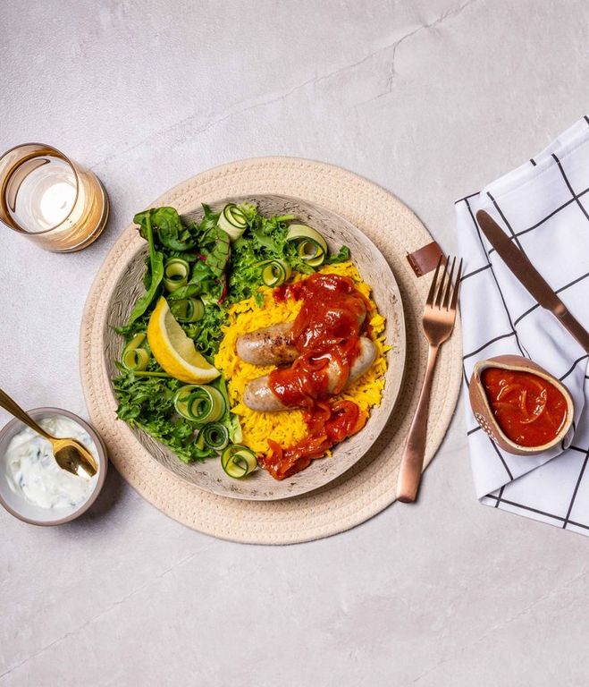 Photo of Tomatoey Pork Bangers & Turmeric Rice