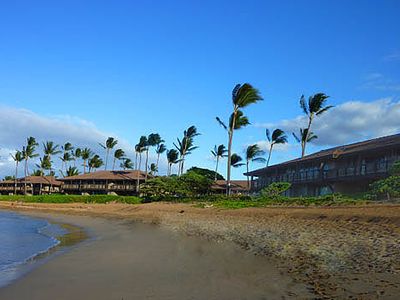 On the beach with views and pool