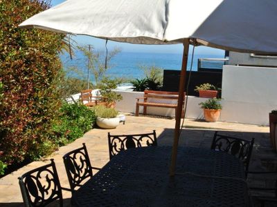 Bay Beach Villa one minute Camps Bay beachfront .