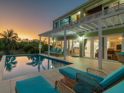 Playa Goma: Serene Luxury on Ambergris Caye.