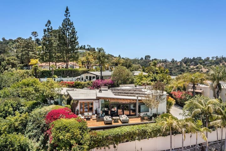 Luxurious Hilltop Mid-Century Retreat With a View!