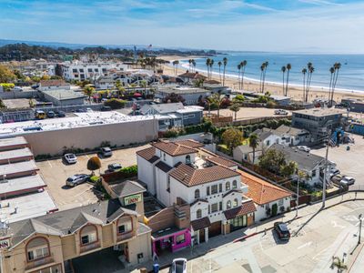 WOW! Gated 5-Suite Coastal Retreat @ Main Beach