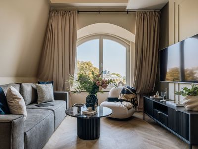 Two-Level Apartment with Bathtub in Bedroom