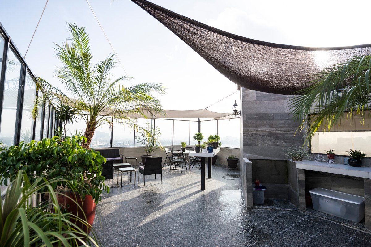 “Artful Comfort in the Heart of Lomas W Balcony”