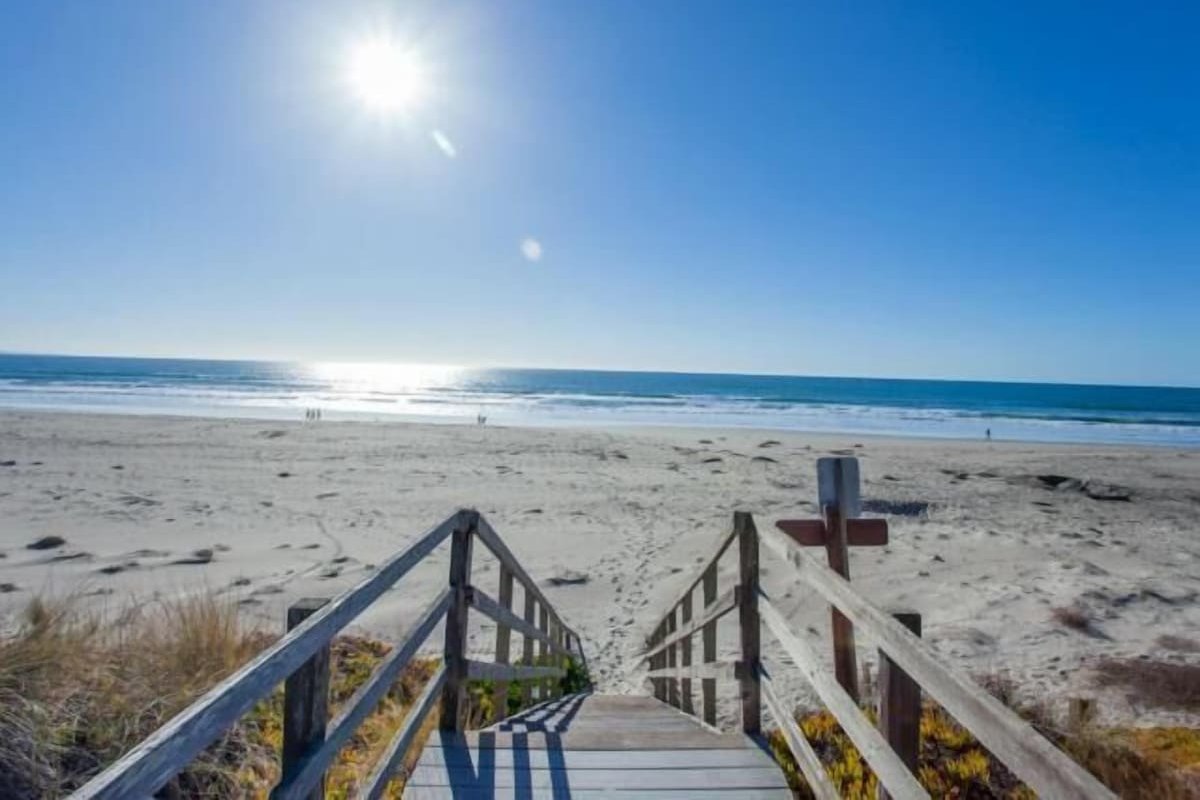 Steps from sand, pickleball, toys, garage!