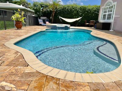 Spacious 4 bedroom house with heated pool