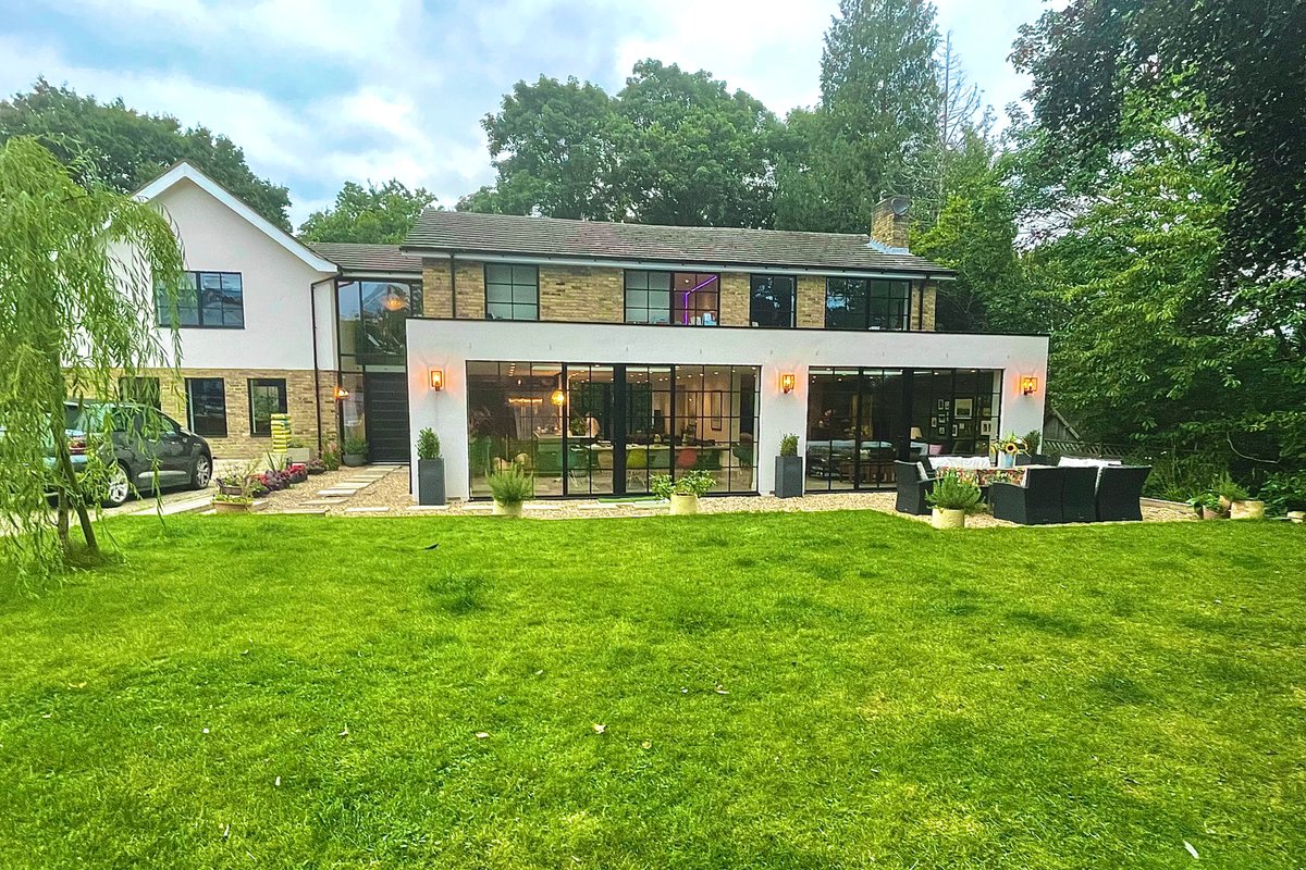 Lovely large modern home in private wooded estate