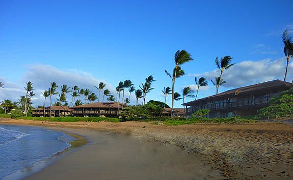 On the beach with views and pool