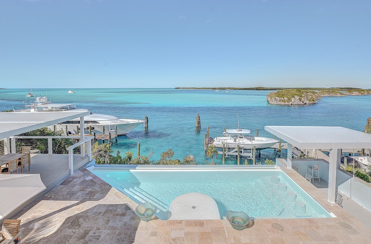 Copasetic infinity edge pool with yacht dockage