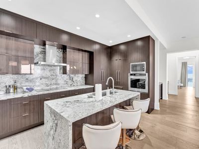 Downtown Luxury Condo with Lake Views + Parking!