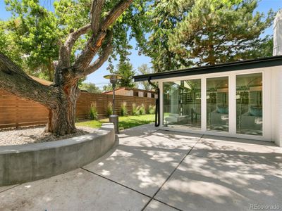 Chic Mid-Mod Cliff May home with hot tub and light