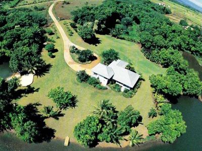 Gated botanical garden retreat with private lake