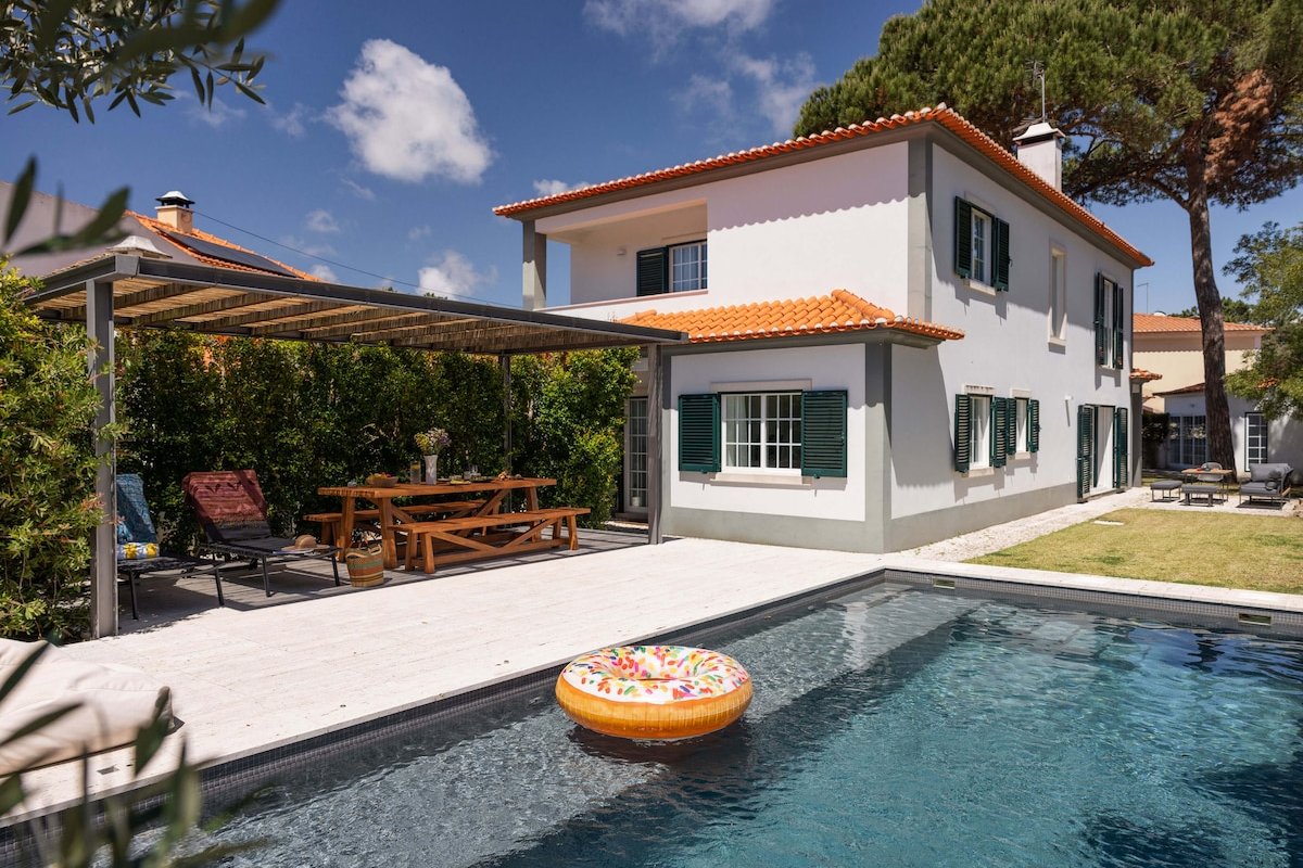 Relaxing home with pine trees, quiet garden & pool gallery image 2