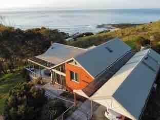 Ocean-side retreat with bush & farm views gallery image 2