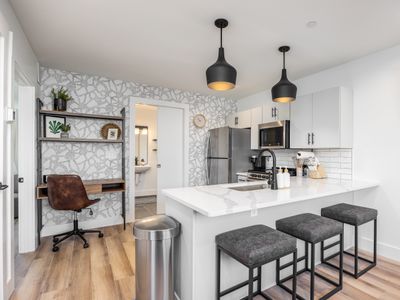 Multi-Condo Building 7 Units, 15 Bedrooms &Parking