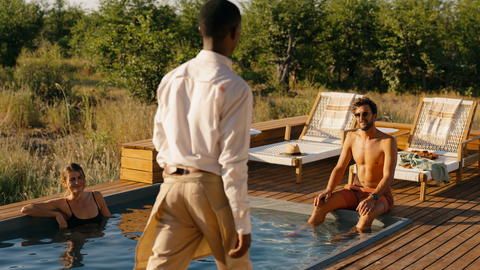 Wilderness Mokete - Beat the heat in the camp pool over an ice-cold drink