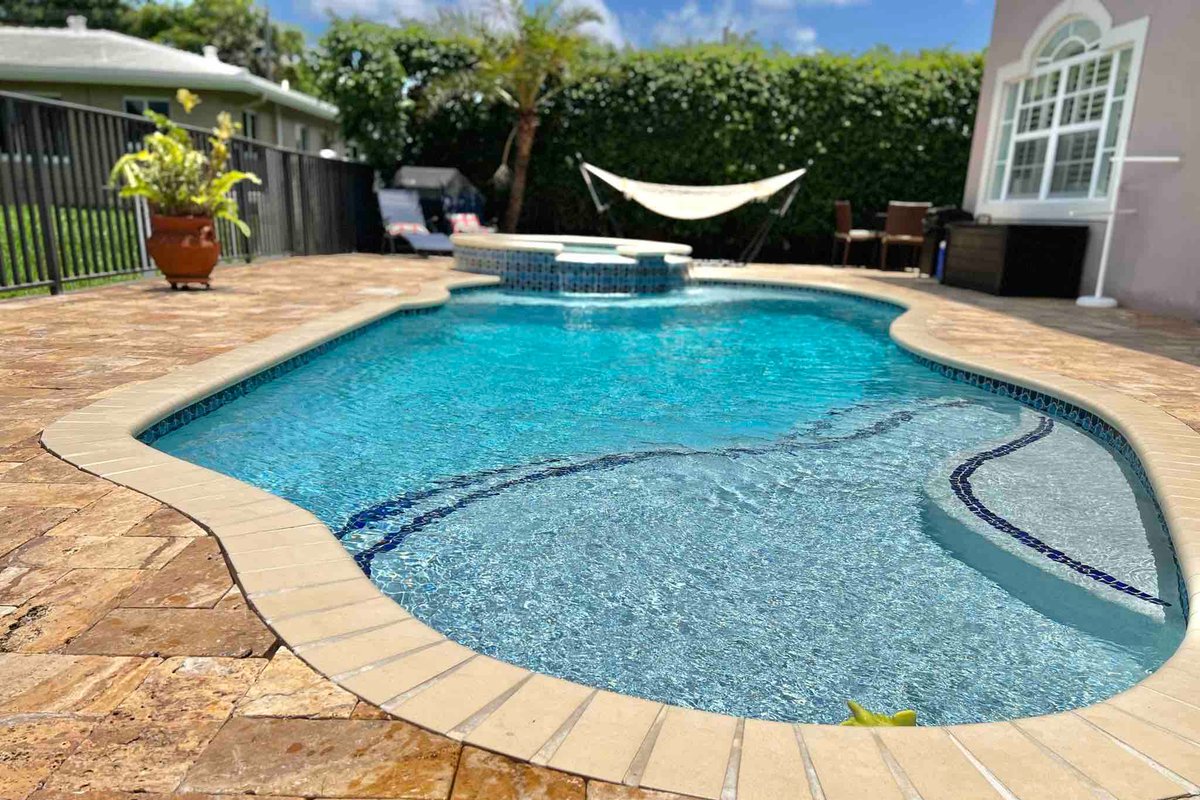 Spacious 4 bedroom house with heated pool