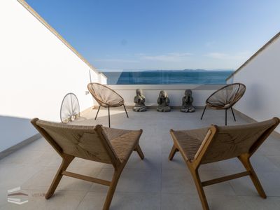 Spectacular seafront house, with a communal pool a