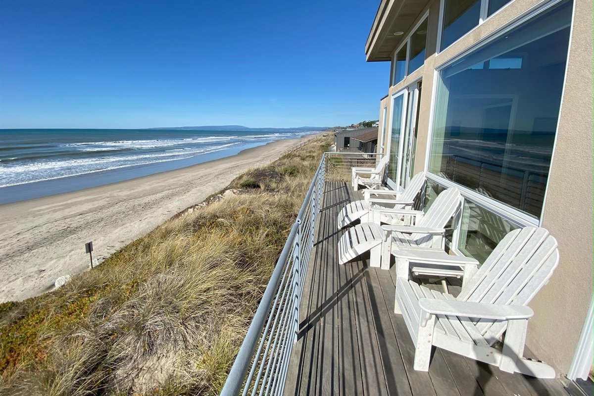 Modern, oceanfront, views, beach for miles!
