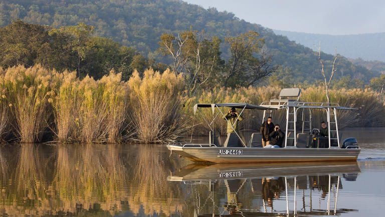 RIver Boat Cruise - Some of the best photography takes place in the afternoons. The evening light lends itself to excellent photos of animals and birds, as well as the magnificent sunsets over the Kubu Dam. The mornings are also very special, with the animals heading to the water for a morning drink. Birding is excellent along the river with frequent sightngs of African darters, fish eagles, kingfishers and other waders and water birds.