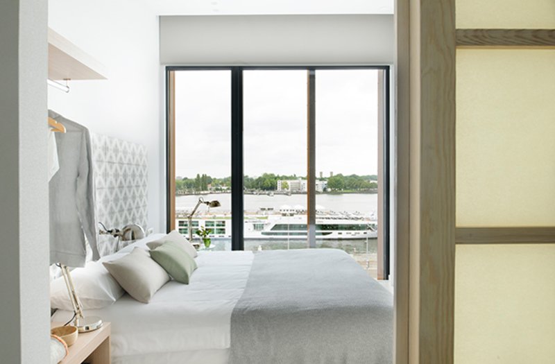 Bright Nordic-Designed Apartment with River View
