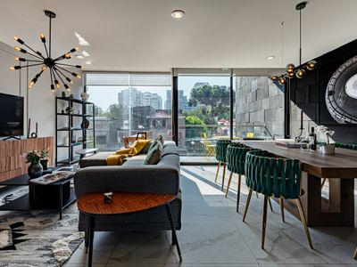 Urban Hideaway with Private Balconies & Coworking