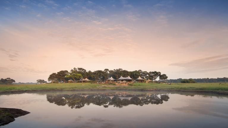 Somalisa Camp - Sunset reflection of camp