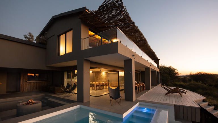 Lodge side view - q areaMain house with pool and BB