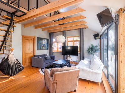 Cozy riverside penthouse