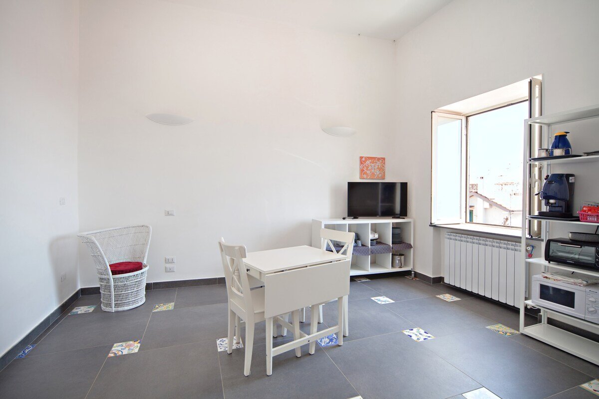 San Mattia rooftop attic – cozy & panoramic gallery image 5