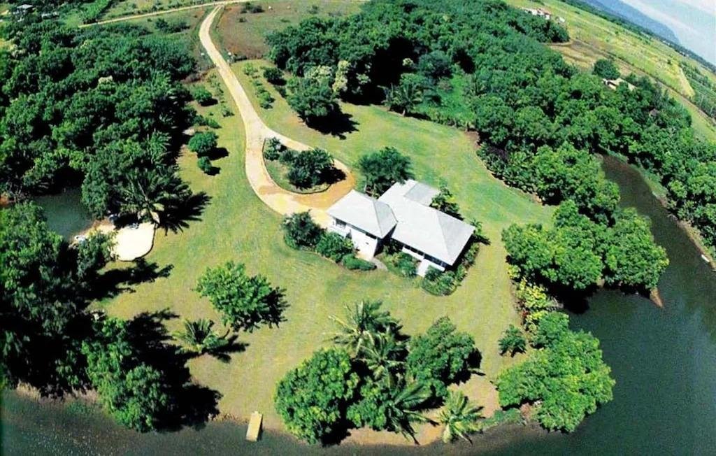 Gated botanical garden retreat with private lake