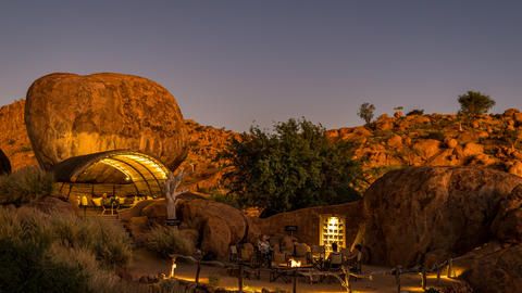 Chiwani Safari Camps' Mowani Mountain Camp Firepit and Elevated Lounge - Take advantage of cool breezes in the lounge during the day or at the firepit under the stars at night.