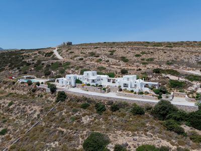 Panoramic three villa complex with helipad