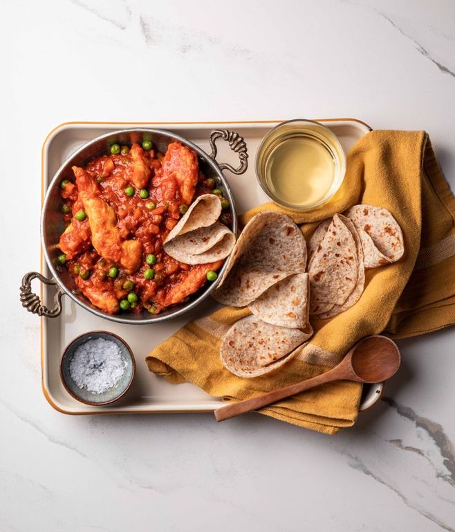 Photo of Saucy Indian-spiced Chicken