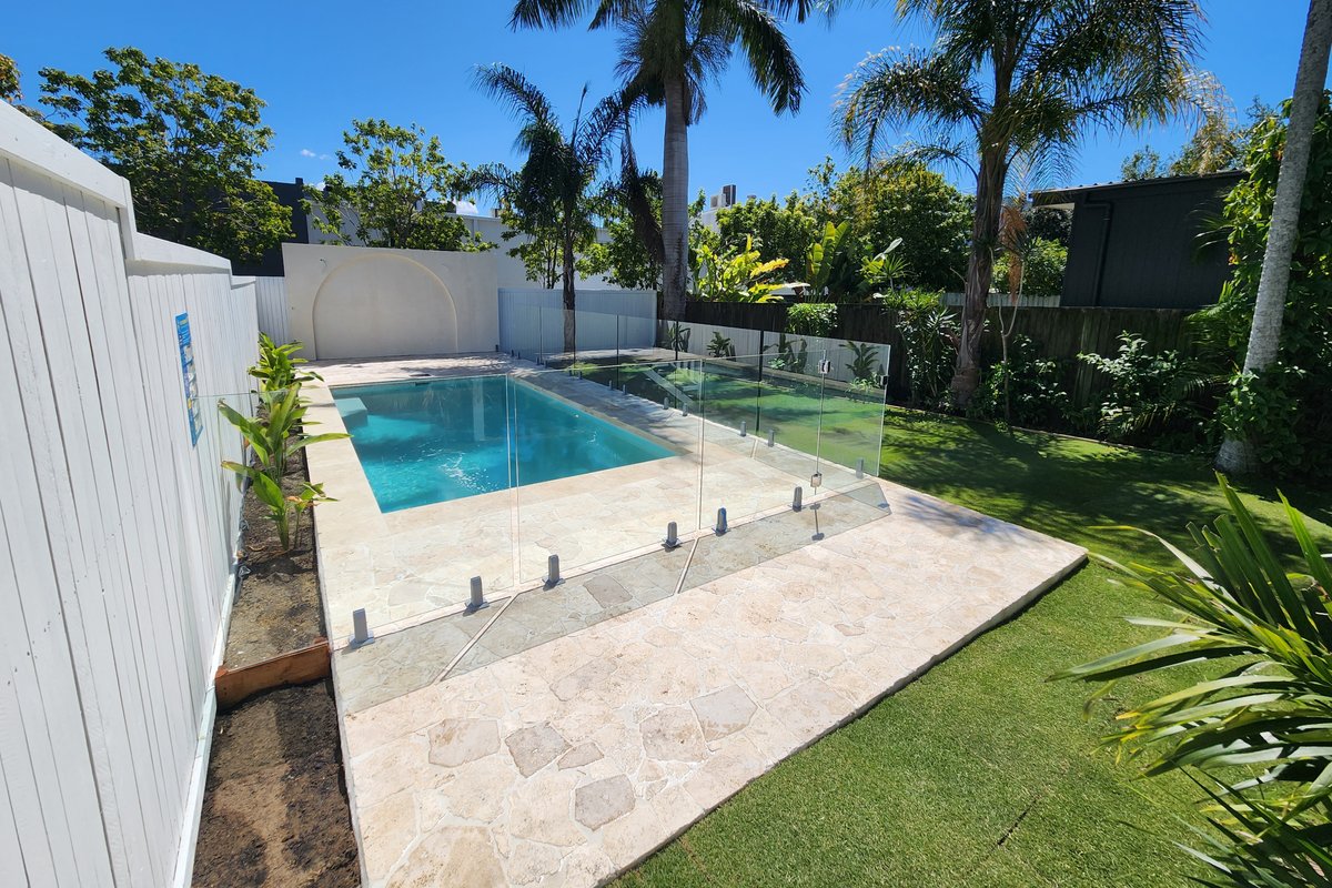 Classic Brisbane Queenslander with a pool and yard
