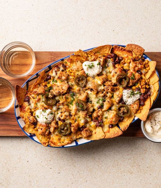 Photo of Cheesy Chicken & Corn Nachos