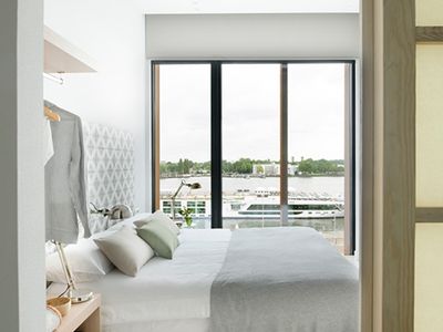 Bright Nordic-Designed Apartment with River View