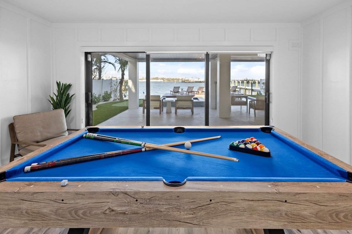 Waterfront Luxury Pool Home, Golf Cart, and Bikes! gallery image 5