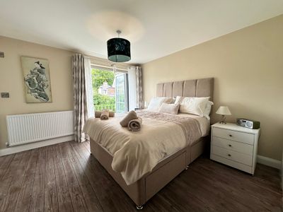 Splendid mews in trendy Bowdon, private parking.