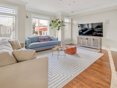 SkyHouse JC – New 3BR Apt w/ Rooftop and Parking