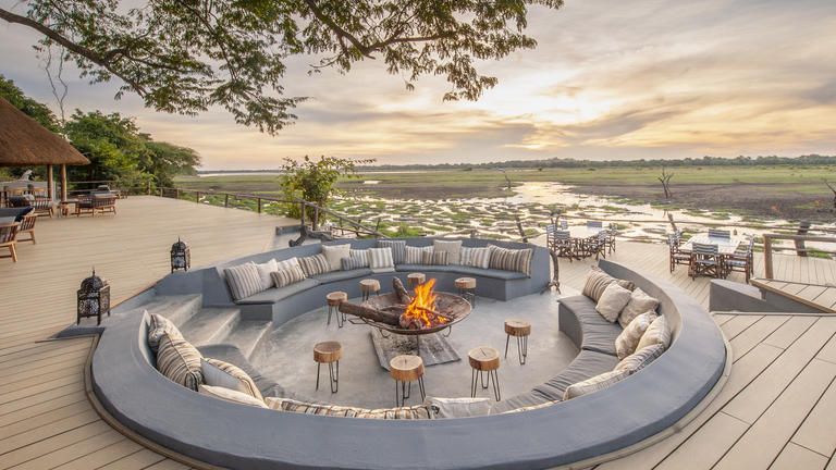 Kafunta River Lodge - Fireplace & Lounge - Superb fireplace and deck overlooking the floodplains