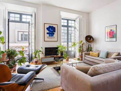 Design & bright central home w/ balcony + parking!